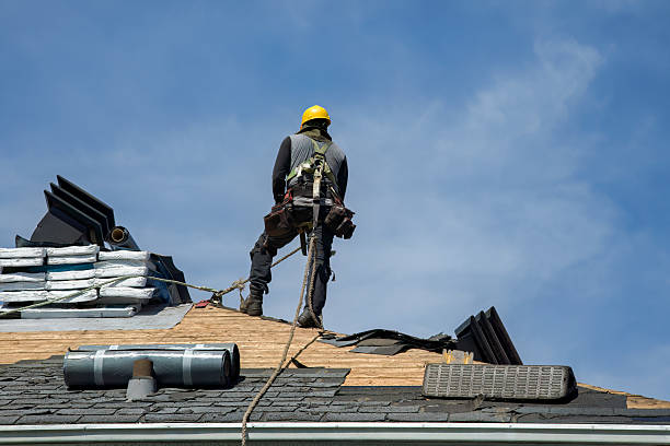 Professional Gutter Installation technician working in Delia, KS